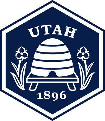 Blue hexagon with a beehive, UTAH, two flowers, and 1896 below.